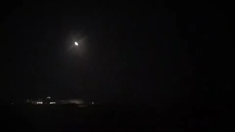 Asteroid Sar2667 explodes in a stunning nighttime light display in UK Stock Footage 233185734