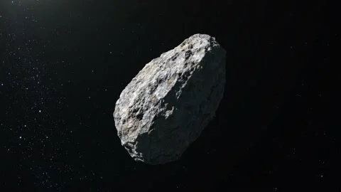 Asteroid in space. The asteroid flies and rotates. Starry sky. 4K. Stars twinkle Stock Footage 144071632