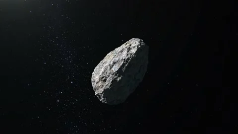 Asteroid in space. Stars twinkle. The asteroid rotates slowly and flies away Stock Footage 140469727