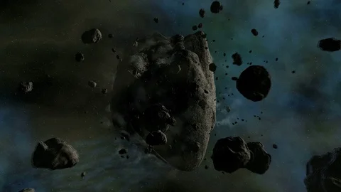 Asteroid traveling in space - slow camera fly trough in 4k quality 3d animation Stock Footage 71669365