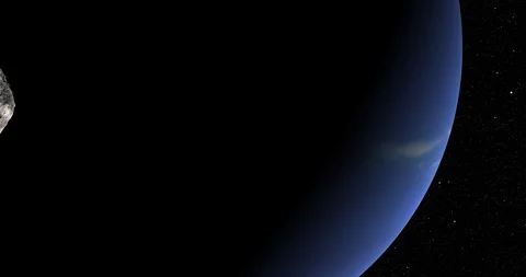 An asteroid tumbles slowly in space as it passes Neptune. Stock Footage 91708975