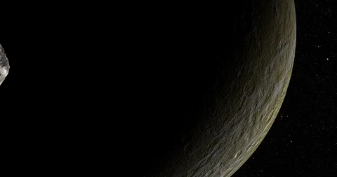 An asteroid tumbles slowly in space as it passes Rhea. Video stock 91709145