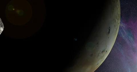 An asteroid tumbles slowly in space as it passes Io. Lens fx, nebulae Stock-Footage 91798376