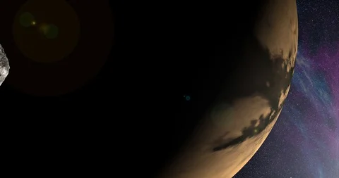 An asteroid tumbles slowly in space as it passes Titan. Lens fx, nebulae Stock Footage 91799020