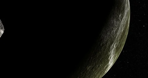 An asteroid tumbles slowly in space as it passes Dione. Stock Footage 92271367