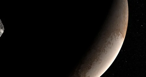 An asteroid tumbles slowly in space as it passes Pluto. Stock Footage 92272424
