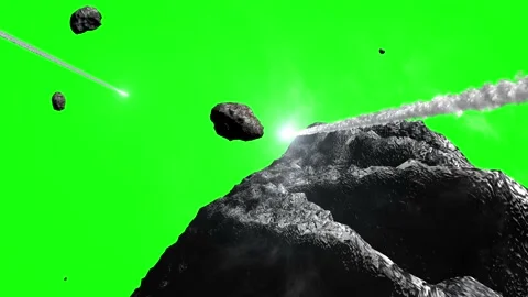 Asteroids Comets flying in on green background Stock Footage 142619658