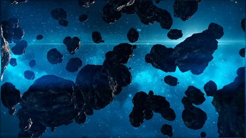 Asteroids drift in deep space among the wreckage of a destroyed planet, a post Stock Footage 119329975
