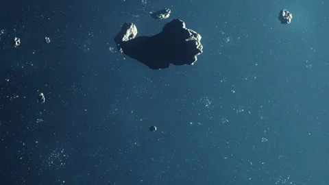 Asteroids float in space with stars in the background Stock Footage 345061883