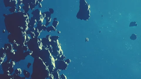 Asteroids floating in space with blue background in distant region Stock Footage 344885051