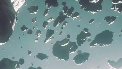 Asteroids floating in space with distant light in the background Stock Footage 345062774