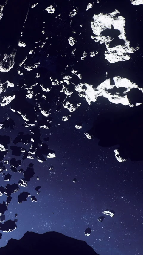 Asteroids floating in space near a dark background filled with stars Stock Footage 339951980