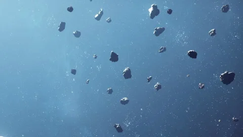 Asteroids floating in space with stars seen in the background Stock Footage 345061528