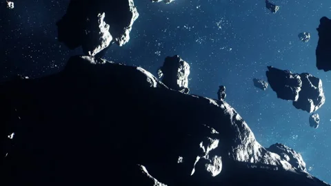 Asteroids floating in space with stars shining in the background Stock Footage 345063644