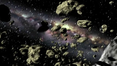 Asteroids or Saturn's ring particles Stock Footage 84860980