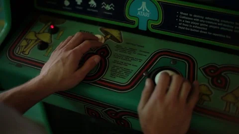 Asteroids - Playing Asteroids in the Arcade Close Up of Hands Stock Footage 87186578