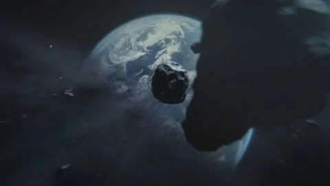 Asteroids sail above planet. Rocks gently drift in orbit around celestial body Stock Footage 330039501