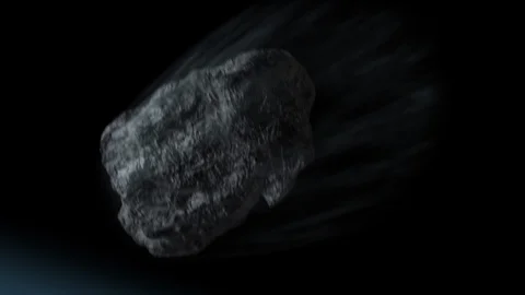 Asteroind in space flying through atmosphere with smoke Video stock 101976615