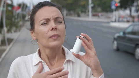 Asthma attack in the city. Stock Footage