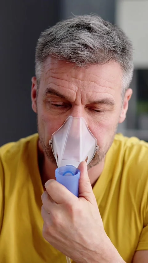 Asthma Patient Breathing Using Oxygen Ma... | Stock Video | Pond5