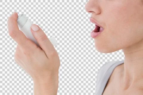 Asthmatic pretty brunette using inhaler Stock Photos
