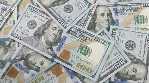 An astonishing array of stacks filled with plentiful Hundred Dollar Bills in abu Stock Photos