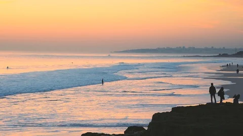 Astonishing sunset sky reflections on the atlantic ocean waves at Carcavelos  Stock Footage 108910792
