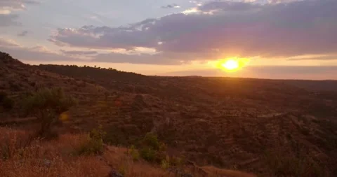 Astonishing sunset at the valley Stockbeeldmateriaal 143263801