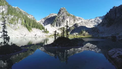 ASTOUNDING 4K DRONE FOOTAGE of LAKE and MOUNTAIN and TREES and ISLAND Stock Footage