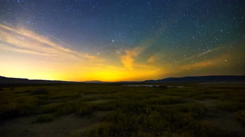 Astro Time Lapse of Milky Way over Wildflower Super Bloom -Tilt Up- Stock Footage