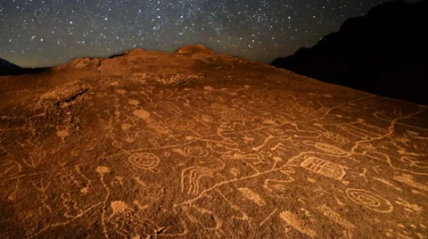 Astro Time Lapse of Star Trails over Native American Petroglyphs -Long Shot- Stock Footage 61773478