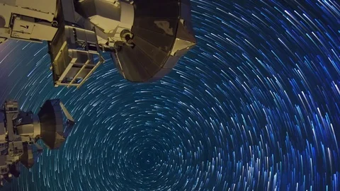 Astro Timelapse of Star Trails over Array of Radio Observatories -Vertical- Stock Footage 69213711