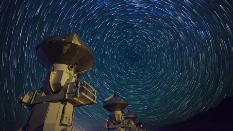 Astro Timelapse of Star Trails over Array of Radio Observatories -Pan Right- Stock Footage 69214003