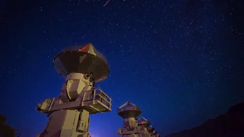 Astro Timelapse of Starry Sky over Array of Radio Observatories  Stock Footage 69214148