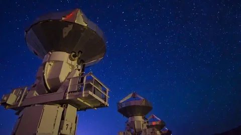 Astro Timelapse of Starry Sky over Array of Radio Observatories -Zoom Out- Stock Footage 69214181