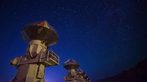 Astro Timelapse of Starry Sky over Array of Radio Observatories -Pan Left- Stock Footage 69214222
