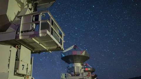 Astro Timelapse Tracking Shot of Starry Sky over Radio Telescope Array Tilt Down Stock Footage 85207197