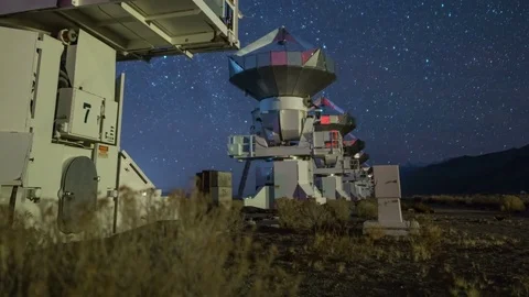 Astro Timelapse Tracking Shot of Starry Sky over Radio Telescope Array -Tilt Up- Stock Footage 85207237