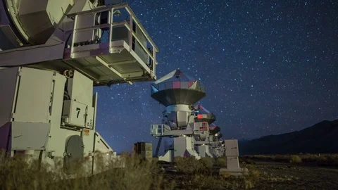 Astro Timelapse Tracking Shot of Starry Sky over Radio Telescope Array Stock Footage 85208059