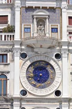 Astrology clock on the side of St. Marco square Stock Photos
