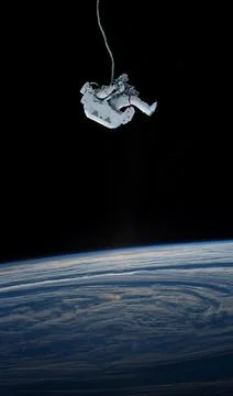 Astronaut and Earth background. Elements of this image furnished by NASA. Stock Photos