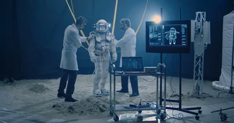 Astronaut and scientists preparing for low gravity test Stock Footage 124281620