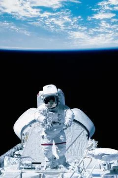 Astronaut and spaceship. Elements of this image furnished by NASA. Stock Photos