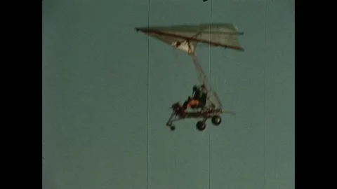 Astronaut and test pilot Neil Armstrong flying paraglider Stock Footage 269506487