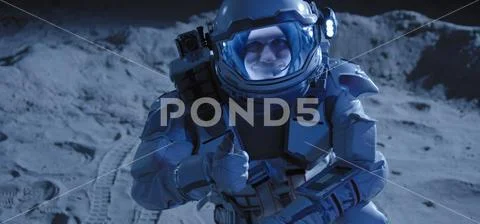 Astronaut checking his surroundings on Moon Stock Photos