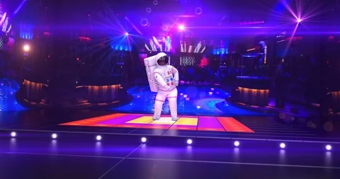 Astronaut Dancing On A Disco Stage - Camera Moving Around Stock Footage 116132852