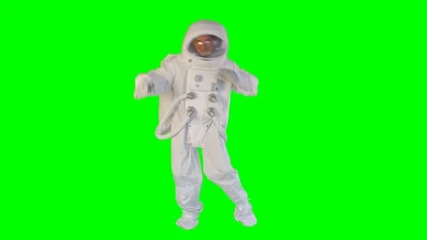 Astronaut dancing on a green background Stock Footage 109271944