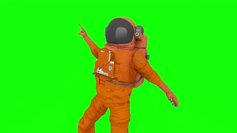 Astronaut is dancing staying alive on green chroma key background Stockbeeldmateriaal 171542403
