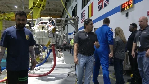 Astronaut David Saint-Jacques is greeted by fellow Canadian Jeremy Hansen Stock Footage 105695341