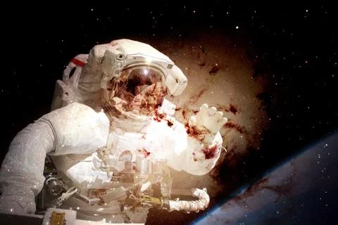 Astronaut in deep space. Elements of this image furnished by NASA Photos